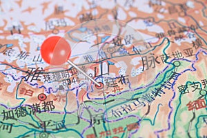 Round tack marks the location of Bhutanâ€™s capital Thimphu on the map