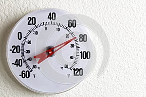 Round Thermometer on a Wall