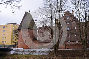 Round tower in the historic surrounding city wall of Slupsk, Poland. Witches tower - Baszta Czarownic. Sights of Poland photo