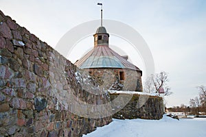 Round tower of Lars Torstennson close up in the cloudy February morning. Korela Fortress, Priozersk. Russia photo