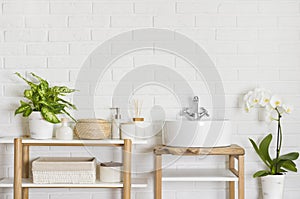 Round vessel sink and wooden shelf in stylish bathroom interior