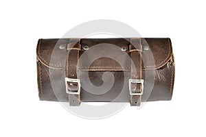 Round vintage leather tool Bag with isolated on white background, pannier or luggage photo