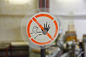 Round warning sign of inadmissibility to touch