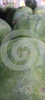 Round watermelons sold by fruit vendors photo