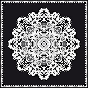 Round white lace ornament on black