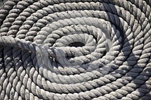 Round white rope on ship