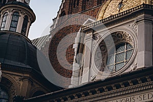 Round window, architectural details of Wawel Royal Castle, Krakow, Poland