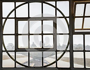 Round window, art deco design overlooking the train platform.