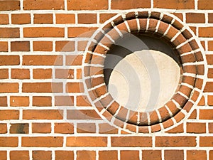 Round window in brick wall