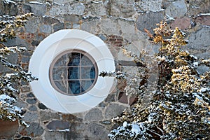 A round window on a church wall