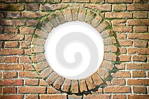 Round window on old and weathered brick wall - concept image with copy space