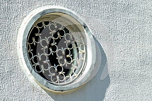 The Round window with wrought iron grating