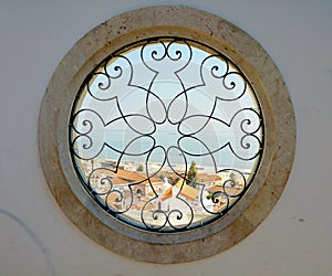 Round windows with harbor view in lissabon