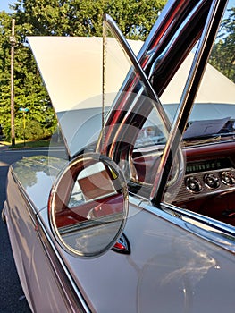 Round Wing Mirror and Vent Window on a Classic Car