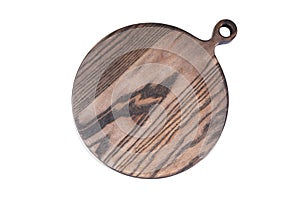 Round wooden cutting board on a white background