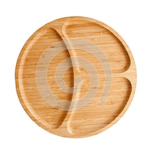 Round wooden plate, dishes with compartments for separation, serving dishes and snacks, isolated on a white background
