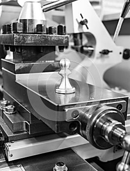 Round workpiece in lathe close-up in the mechanical assembly shop of the enterprise