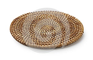 Round woven placemats on a white background