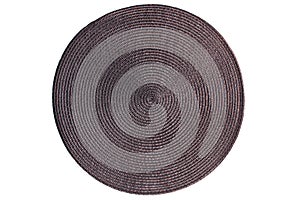 Round woven straw mat isolated against white background