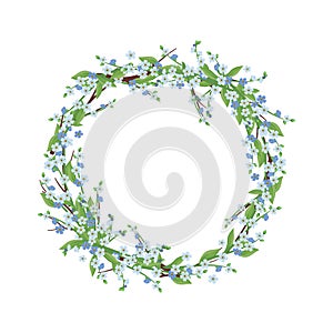 Round wreath of blue forget me not flowers.