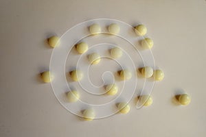 Round yellow mints of xylitol from above