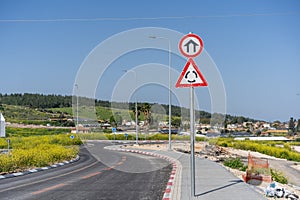 Roundabout Ahead And Urban Entry Road Signs.