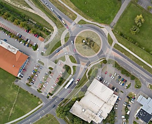 Roundabout with malls and parking lot