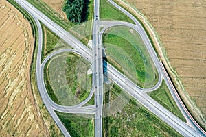 Roundabout in the middle of agricultural grain fields. aerial view