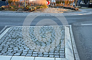 roundabout with perennial flower bed.