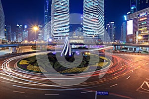 Roundabout traffic at night