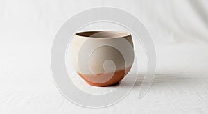 Rounded ceramic cup with a smooth