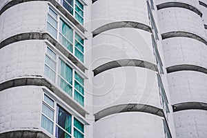Rounded shape comercial building with windows photo