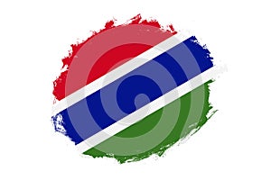 Rounded stain stroke brush textured national flag of Gambia on white background