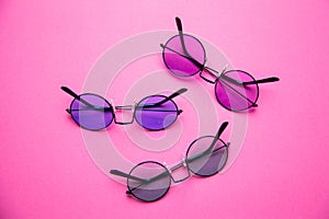 Round Prop Sunglasses on Pink Background Landscape photo