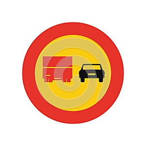 Rounded traffic signal in yellow and red, isolated on white background. Temporary overtaking prohibited for trucks
