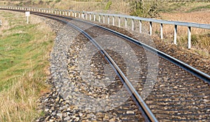 Rounding of railway abandoned rusty,. Empty turning single track of railways.