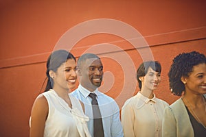 They roundup as the most talented team. a group of businesspeople standing outdoors.