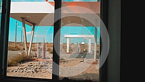Route 66. crisis road 66 fueling broken window slow lifestyle motion video. Old dirty deserted gas station. U.S. closed