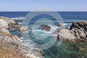 Route of the Fishermen, located in the southwest of Portugal, with its rock formations and crystalline sea.