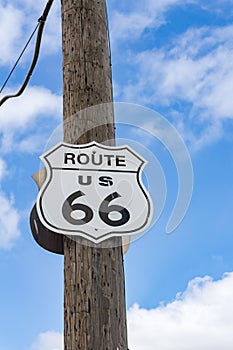 Route US 66 highway sign on power pole Route 66 USA.  one of the incredible variety of 66 signs seen along the historic route