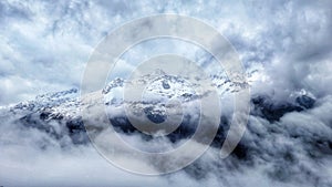 Routeburn Track New Zealand. Mountain in the clouds