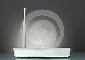 A router with WPS function on gray photo