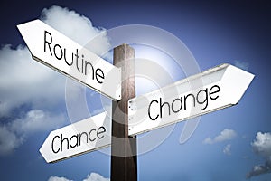 Routine, change, chance concept - signpost with three arrows