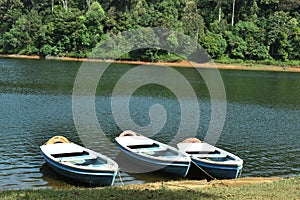 Roving boat on lake side