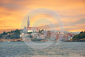 Rovinj, Croatia. Sunset over old town in Istria with Adriatic sea and blue sky