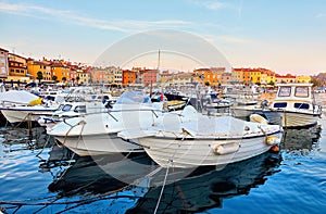 Rovinj old town, Croatia. Motorboats and on water