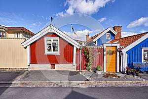 Row of ancient colorful wooden houses in the city