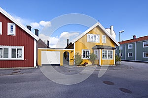 Row of ancient colorful wooden houses in the city