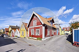 Row of ancient colorful wooden houses in the city