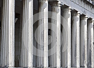 Row of ancient Greek pillars photo